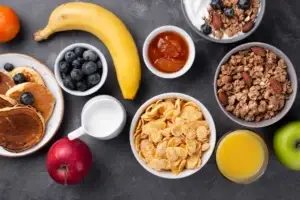 healthy pre workout snacks for energy and endurance – banana, oats, yogurt, apples, blueberry.